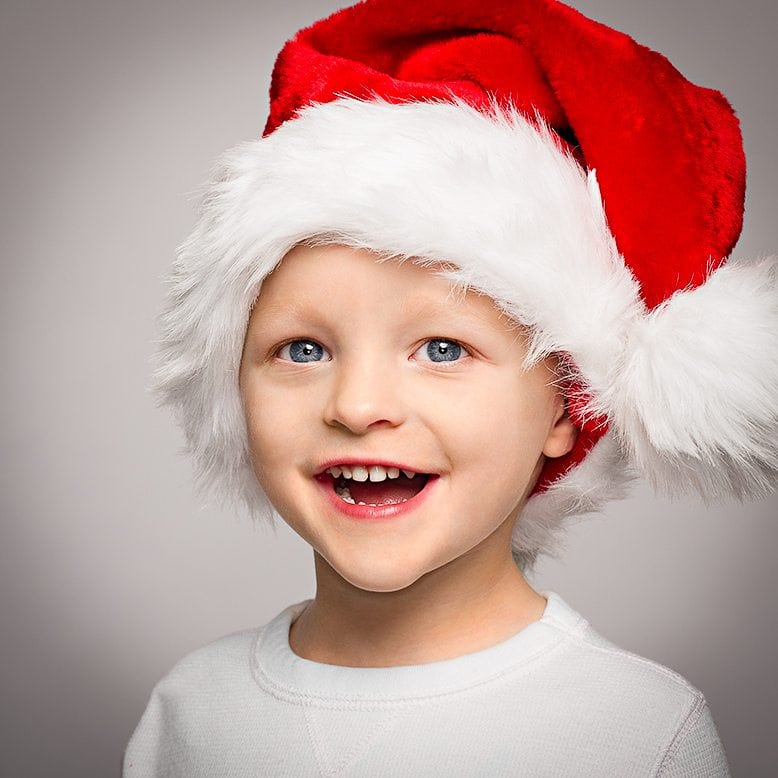 Kid with Santa hat on