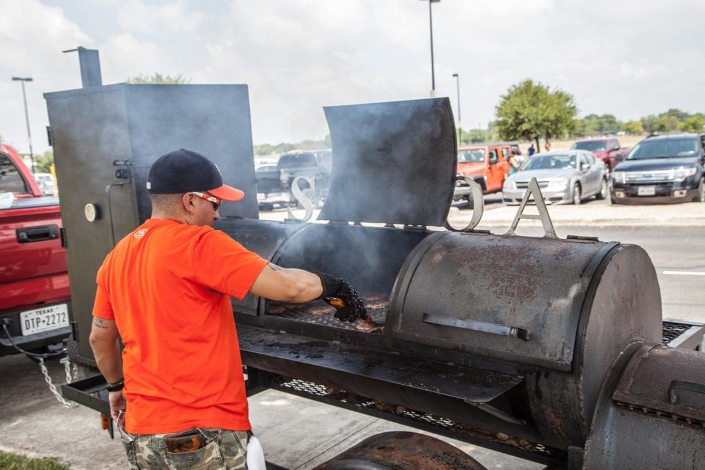 Law Enforcement Officers Give Back by grilling at charity event